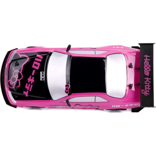 jada toys hello kitty nissan skyline gt r (bnr34) drift power slide elite r:c, usb charging, with 4 extra tires, pink1
