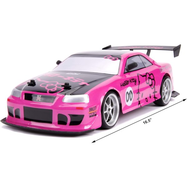 jada toys hello kitty nissan skyline gt r (bnr34) drift power slide elite r:c, usb charging, with 4 extra tires, pink4