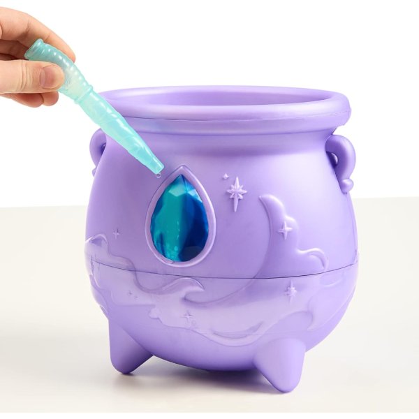 magic mixies color surprise magic cauldron. reveal a mixie plushie from the fizzing cauldron and discover 6 magical color change surprises2