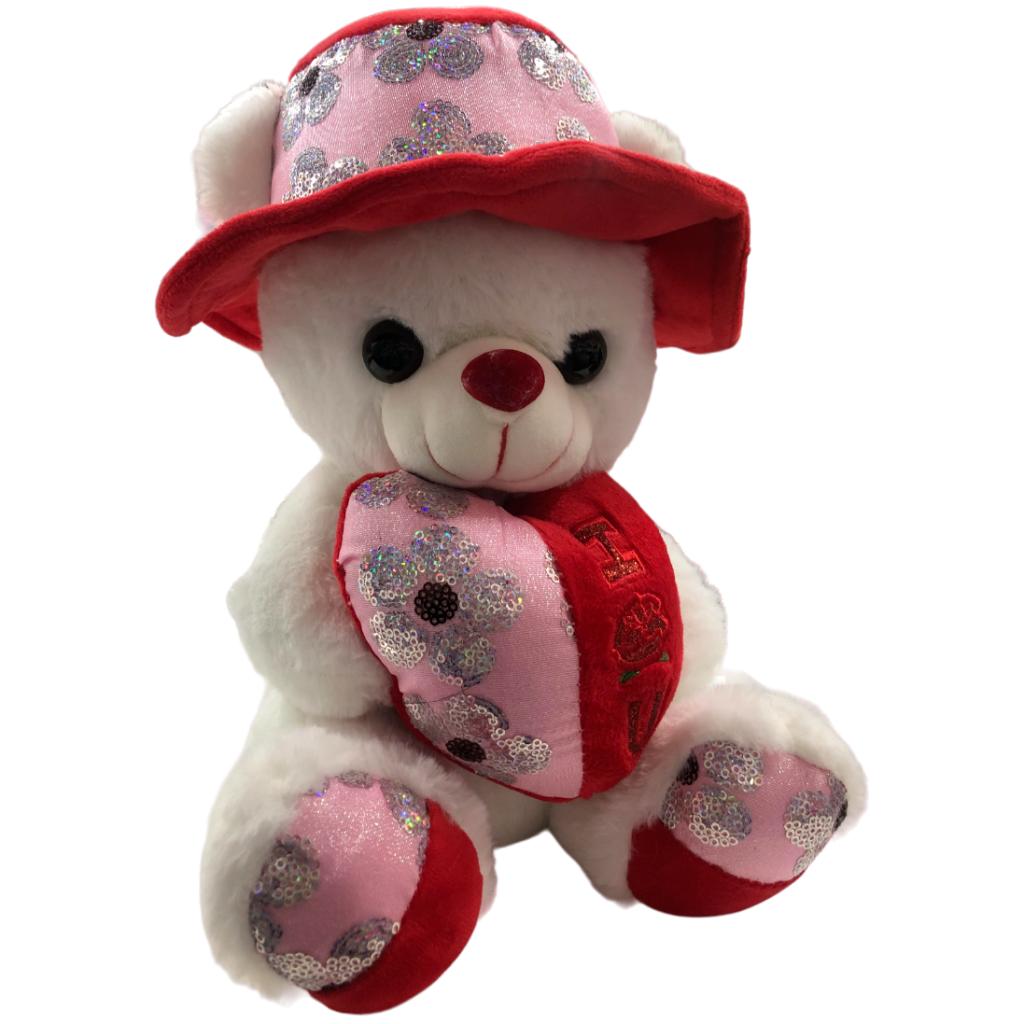 white teddy plush with red and pink heart