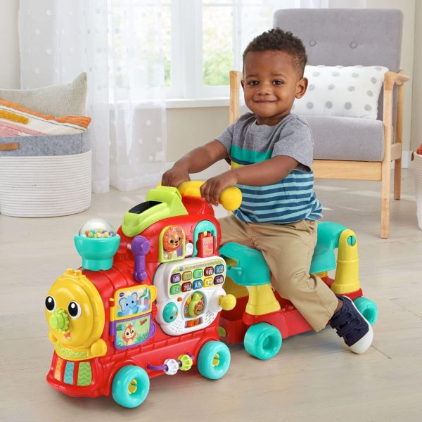 vtech 4 in 1 learning letters train sit to stand walker and ride on4